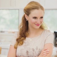 lynn greenberg smiling after getting our design services with creatopia digital marketing